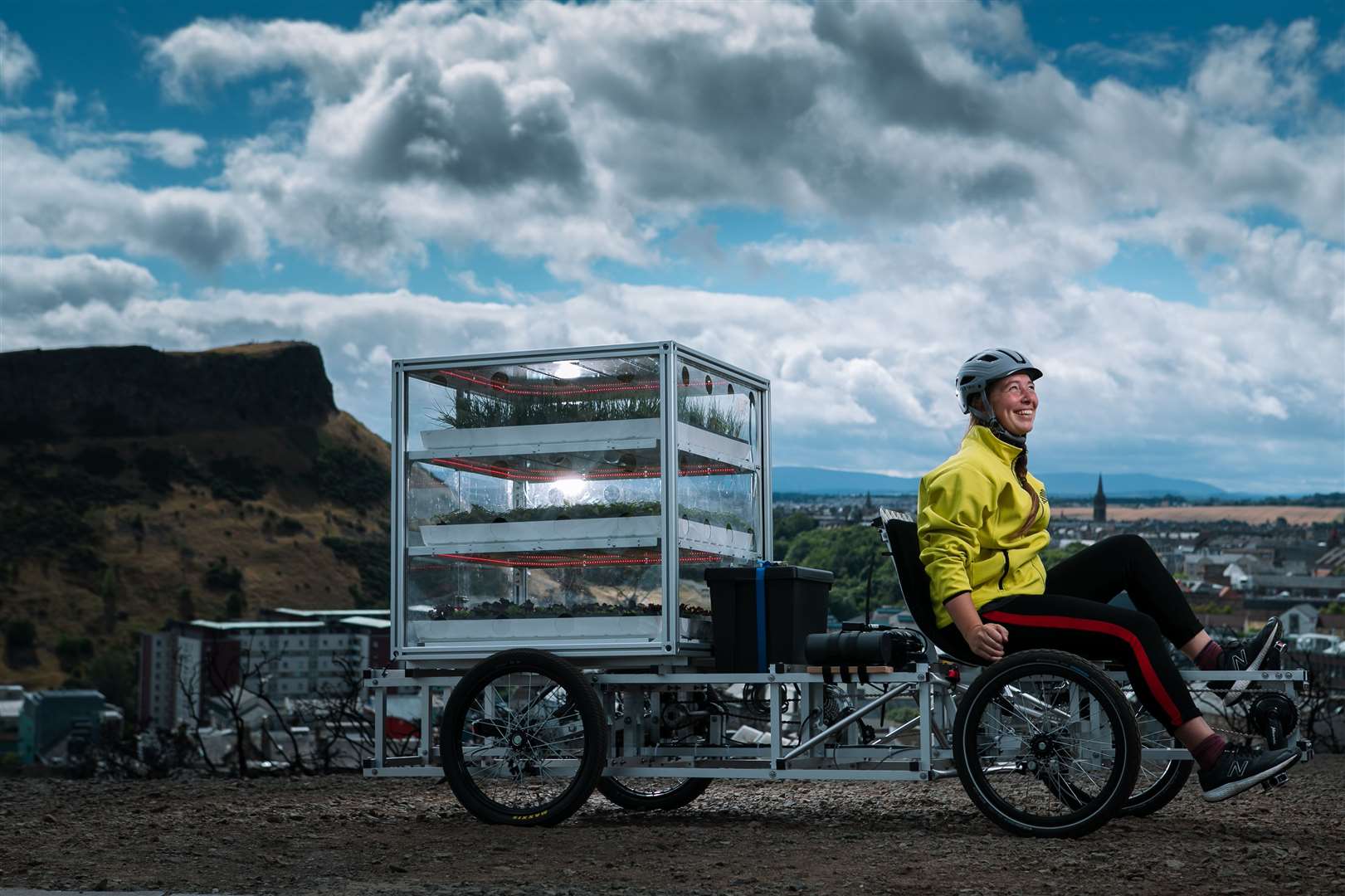 Eilidh Graham sets off from Edinburgh on a cargo bike carrying a miniature vertical farm as part of Dandelion's programme to encourage people to 'grow their own'. Picture: Andrew Cawley.