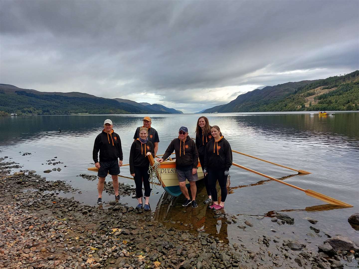The Nairn skiff crew with Dulsie at Loch Ness left tor right: Andy Walker, Leah MacKay, Ian Bochel, Neil Munro, Lauren Stewart and Lucy Gardiner