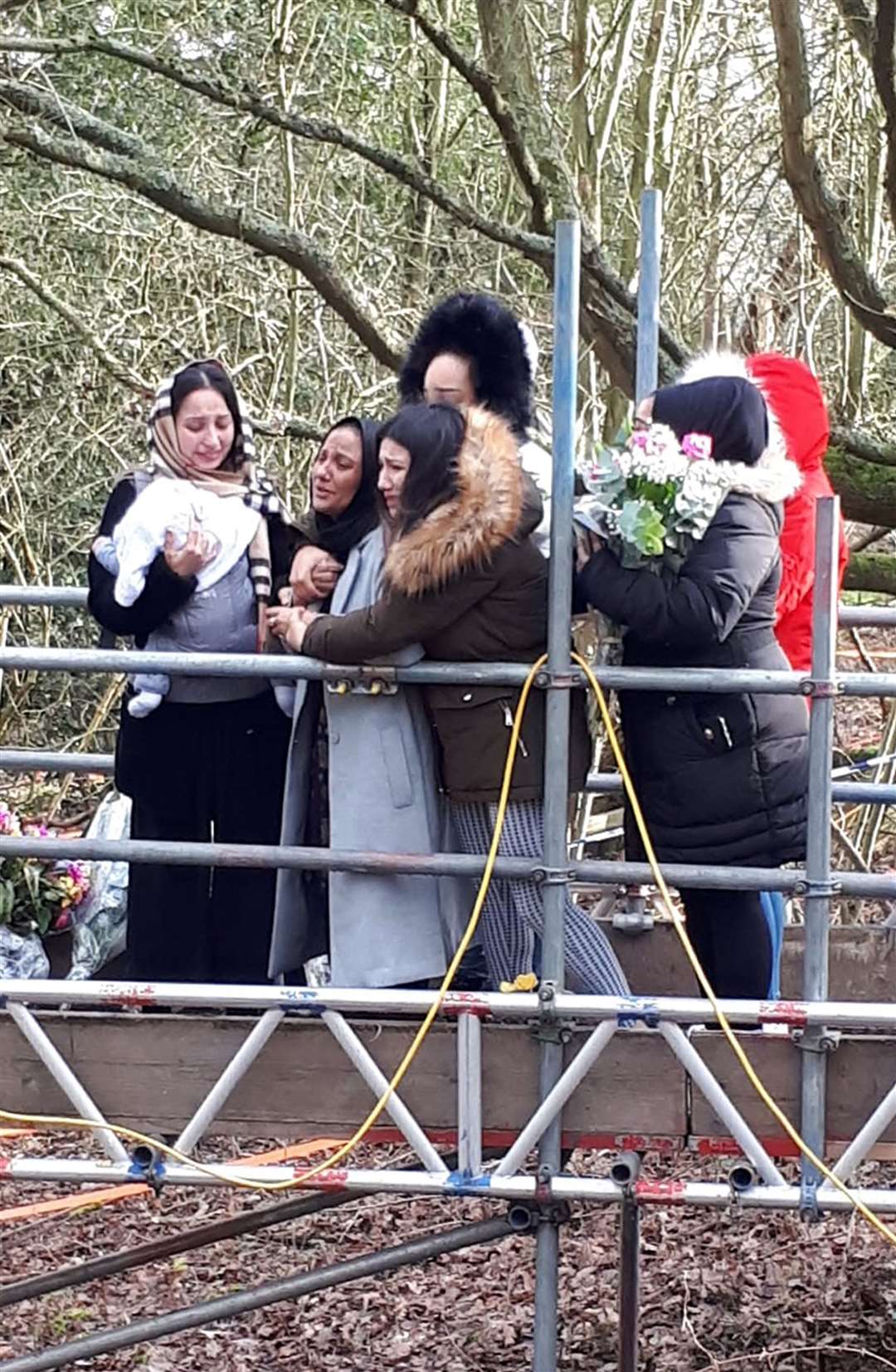 Members of Mohammed Shah Subhani’s family visit the site in Buckinghamshire where his remains were found (Metropolitan Police/PA)