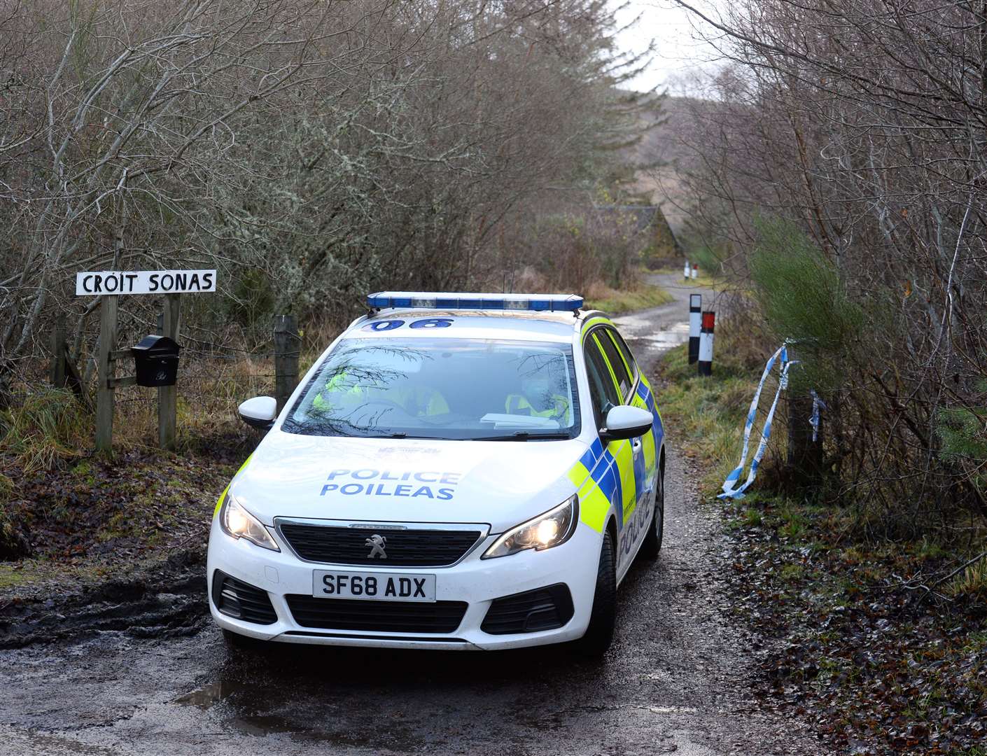 Police cordon off scene of "unexplained death" at Culnakirk near Loch Ness.