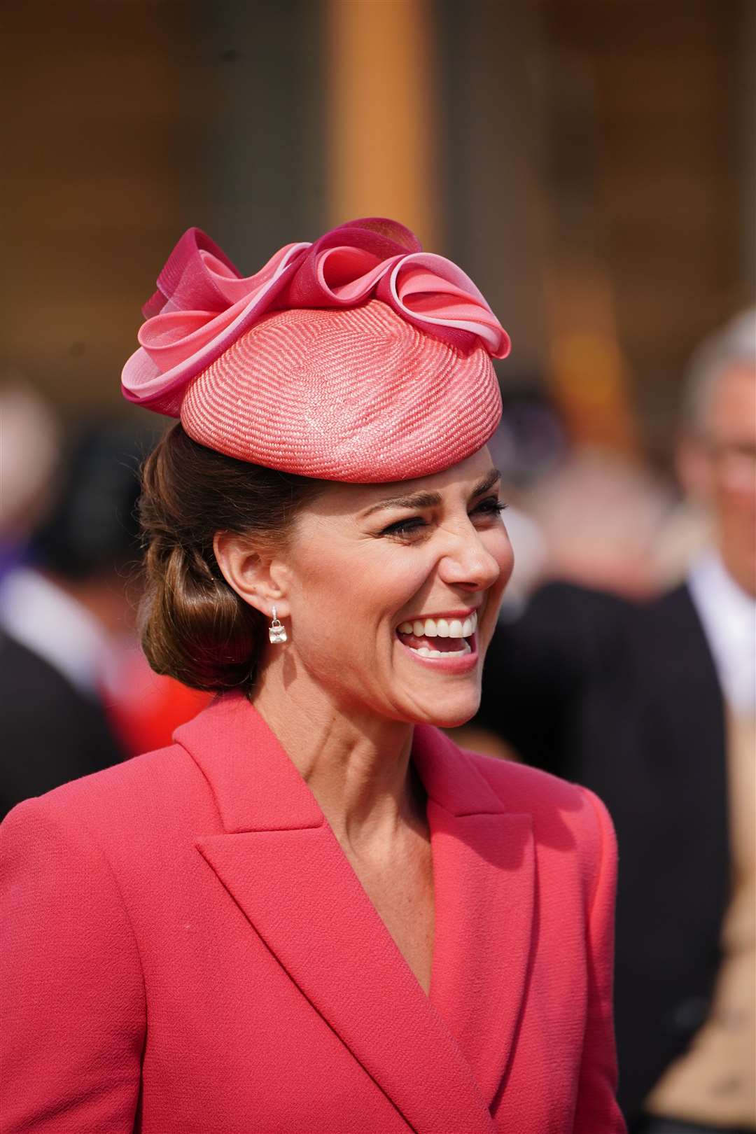 The Duchess of Cambridge seemed in good spirits as she laughed with guests at the Royal Garden Party (Dominic Lipinksi/ PA)