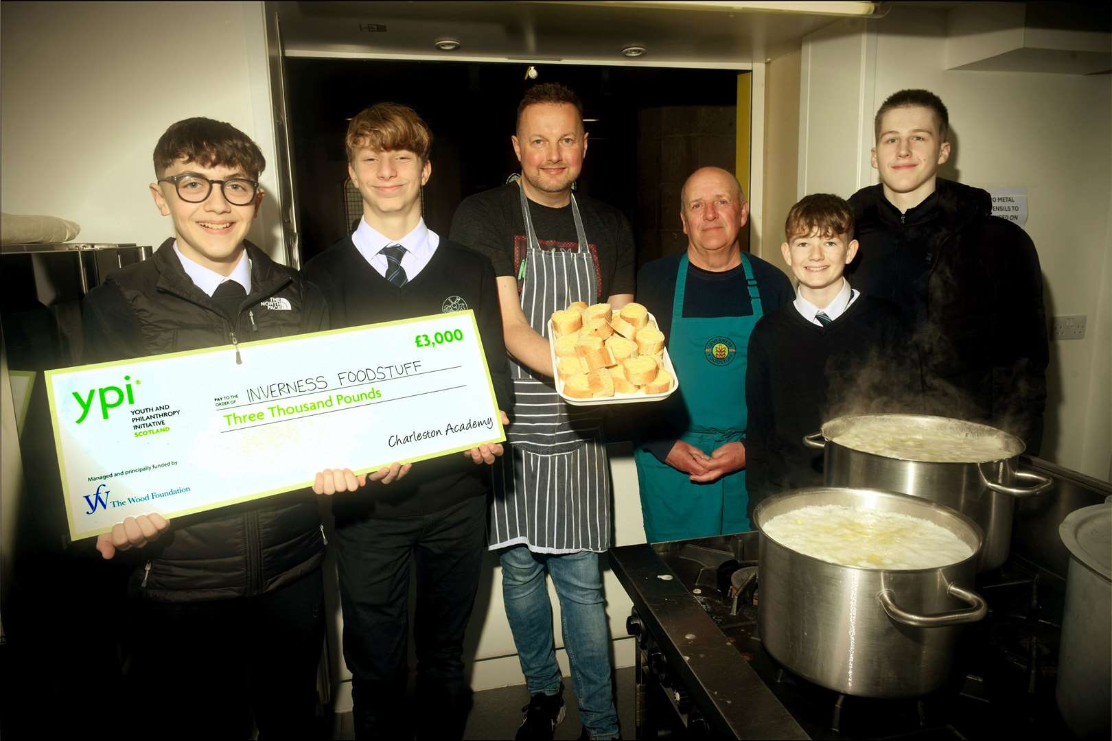Charleston Academy pupils Owen Macleod, Sam Meier, Danny Brindle and Bastion Burkhard with catering and training supervisor Al Edwards and volunteer and trustee Dave Kemp. Picture: James Mackenzie.