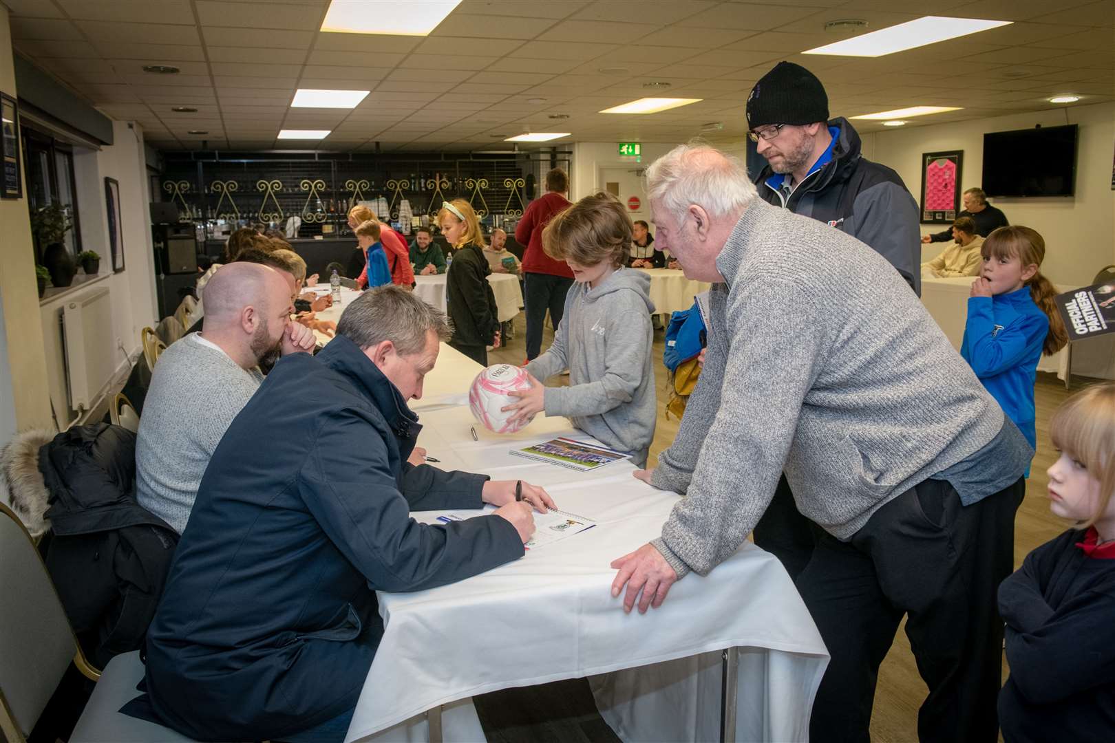 The signing was held in the Highlander Lounge at the Caledonian Stadium. Picture: Callum Mackay