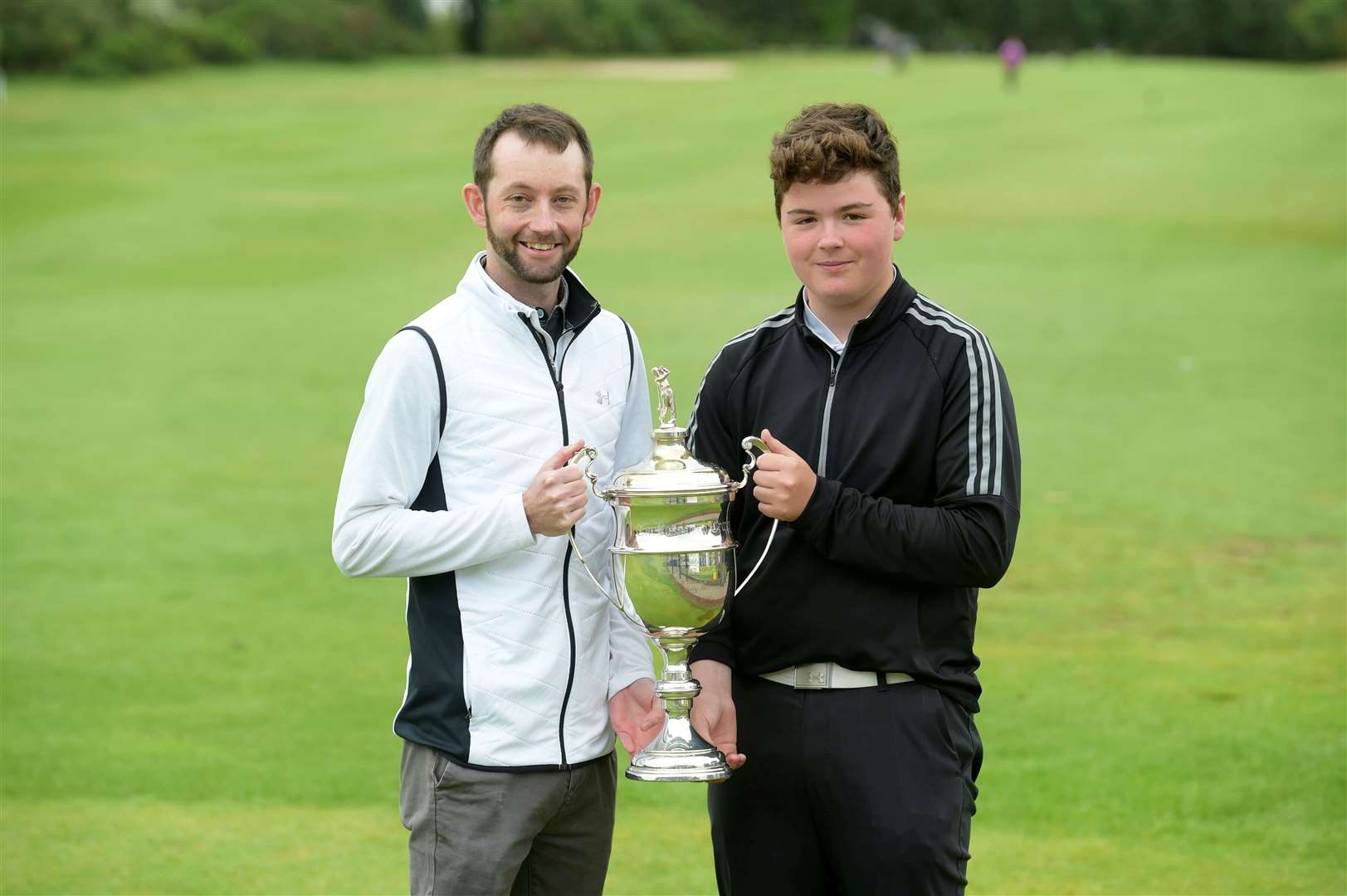 Kyle Godsman and Calum Daun pictured with the Rosswood Trophy before the final. Picture: Callum Mackay. Image No. 044318.