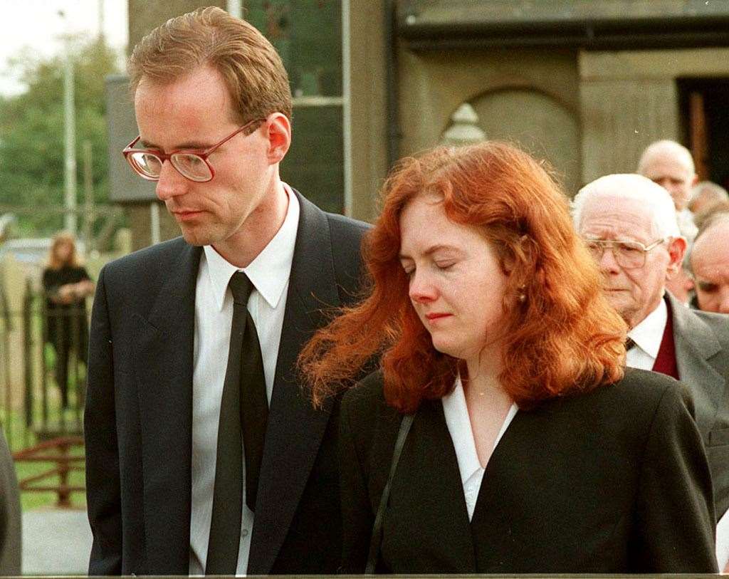 Cheryl Tooze and her boyfriend Jonathan Jones at the funeral of her murdered parents Harry and Megan Tooze (PA)