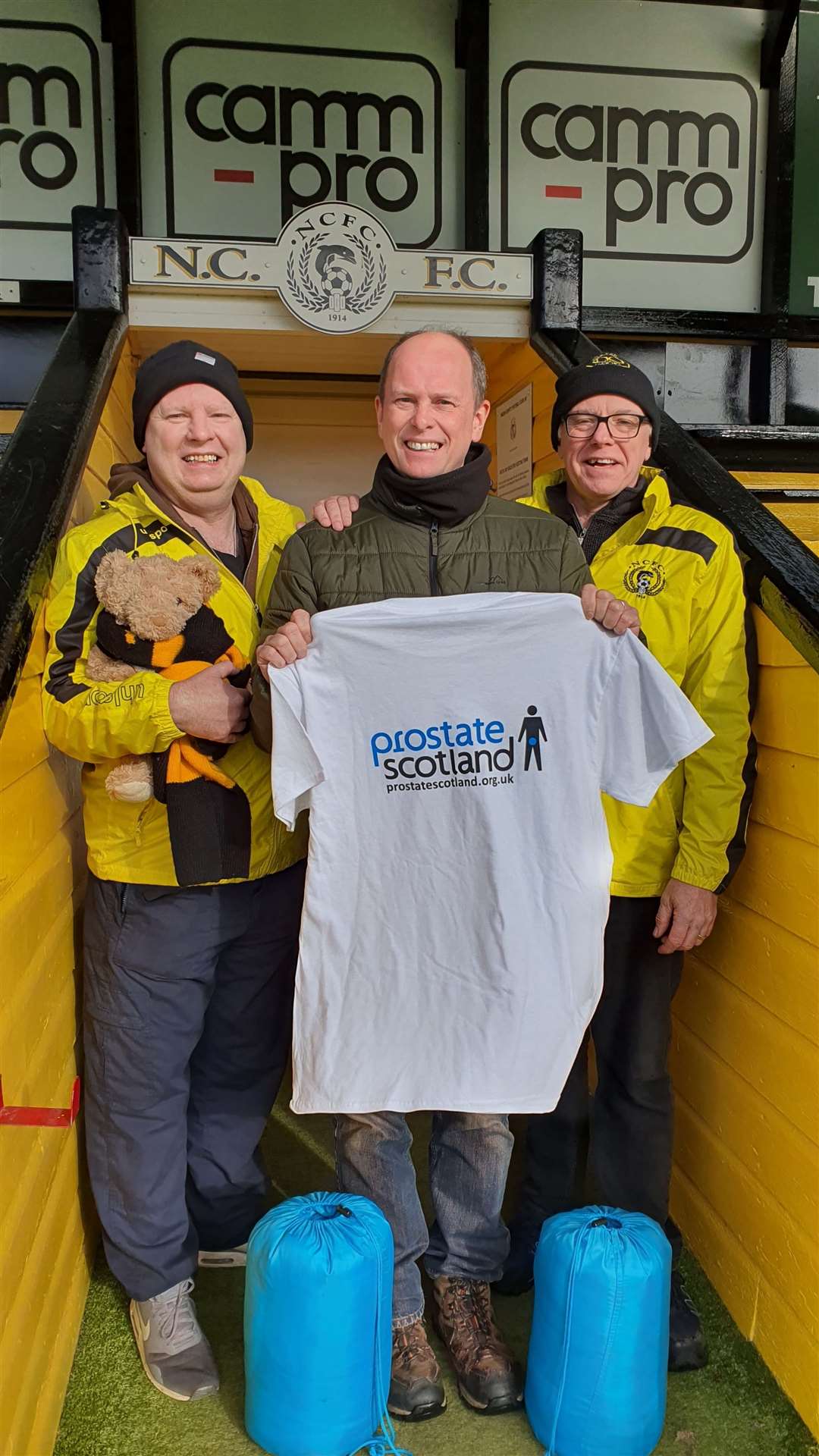 Donald Graham (centre) who underwent surgery for prostate cancer and Nairn County pals Ian Finlayson, Secretary (left) and chairman Donald Matheson slept out in the stand at Station Park to raise funds for Raigmore Hospital and Prostrate Scotland.