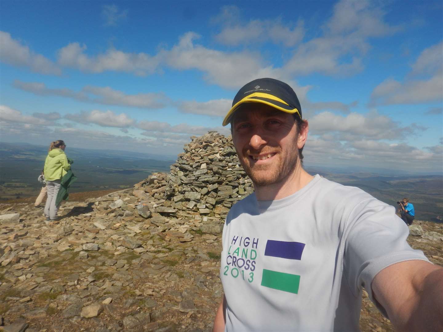 John at the summit cairn on Meall a' Bhuachaille before the final descent.