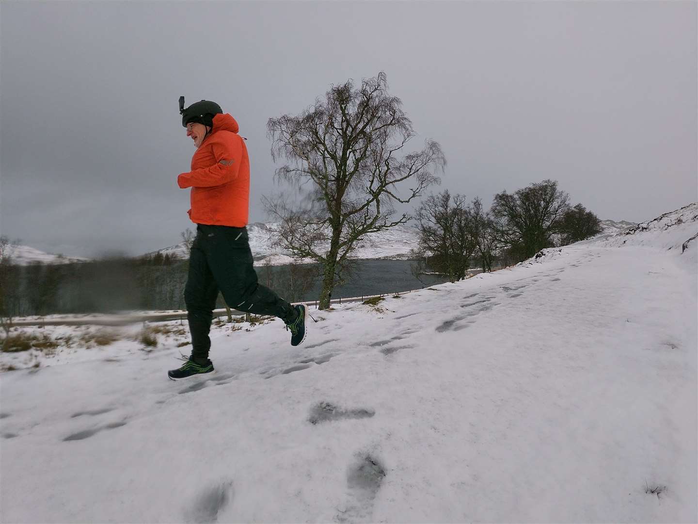 Graeme Ambrose battles the elements on the South Loch Ness Trail above Loch Tarff.