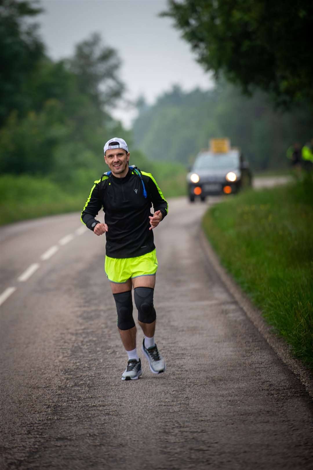 The Brora Rangers Team manager, Steven Mackay ran an ultra marthon of 80 miles in 24hrs to raise money for MFR cash for kids with the support of Craig Campbell and David Hind...On the last marathon of three just outside Bonar Bridge...Picture: Callum Mackay..