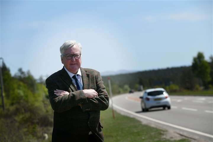 MSP Fergus Ewing, standing by the A9, is not for backing down. Picture: Callum Mackay.