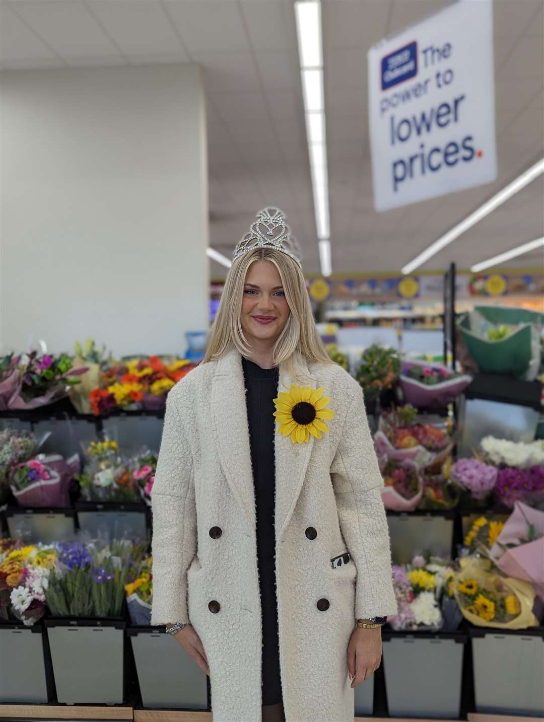 Miss Scotland wearing her crown in Tesco