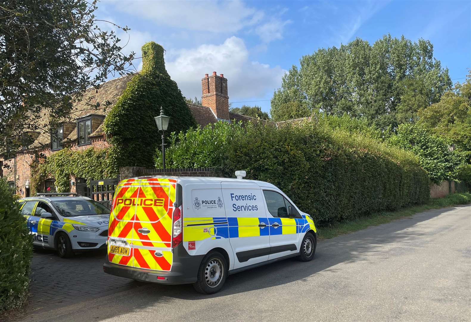 A property in Lady’s Drove, Emneth, Norfolk, is sealed off by police (Sam Russell/ PA)