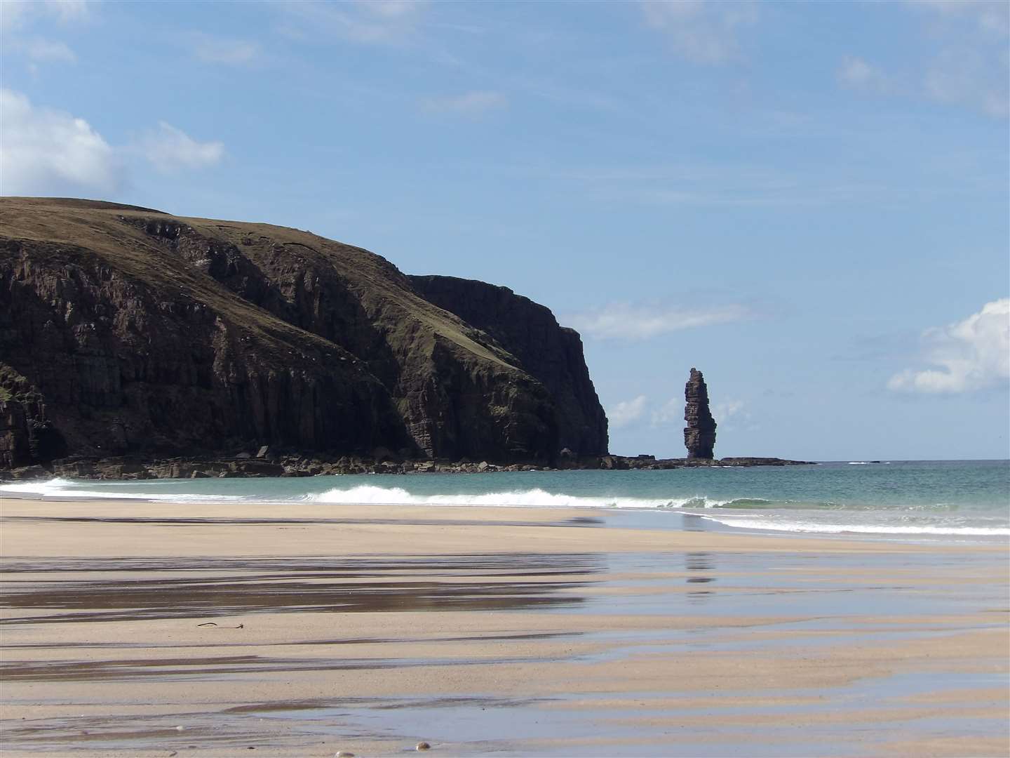 Looking towards the sea stack of Am Buachaille from Sandwood Bay.