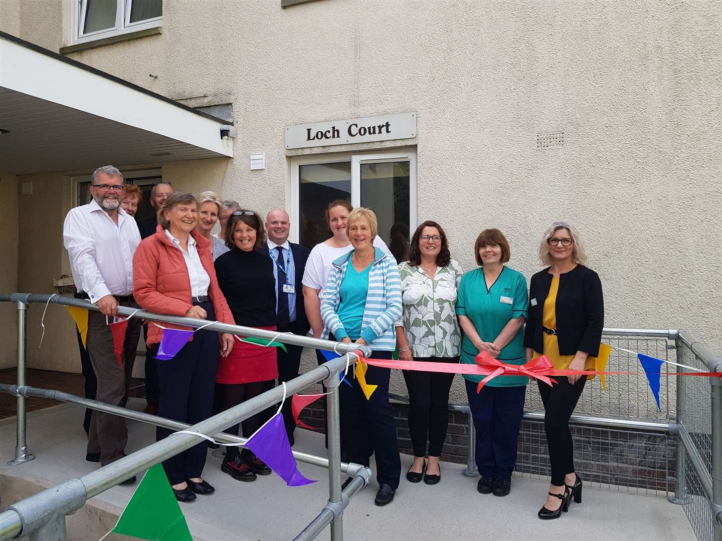 Accommodation team with Raigmore Patients’ Council members Pat Dobbie (second left) and Linda Burgin (fourth right), as well as NHS Highland chief executive Iain Stewart (centre).