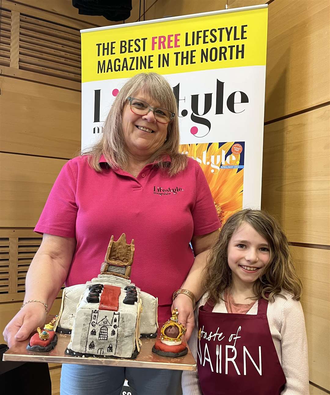 Junior Showstopper Cake Winner Isla MacLennan with the showstopper sponosr Rhona Patterson of Lifestyle Magazine.