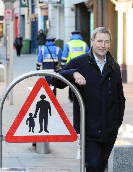 Begg shoes owner Garek Begg is backing calls for changes to city centre parking in Inverness.