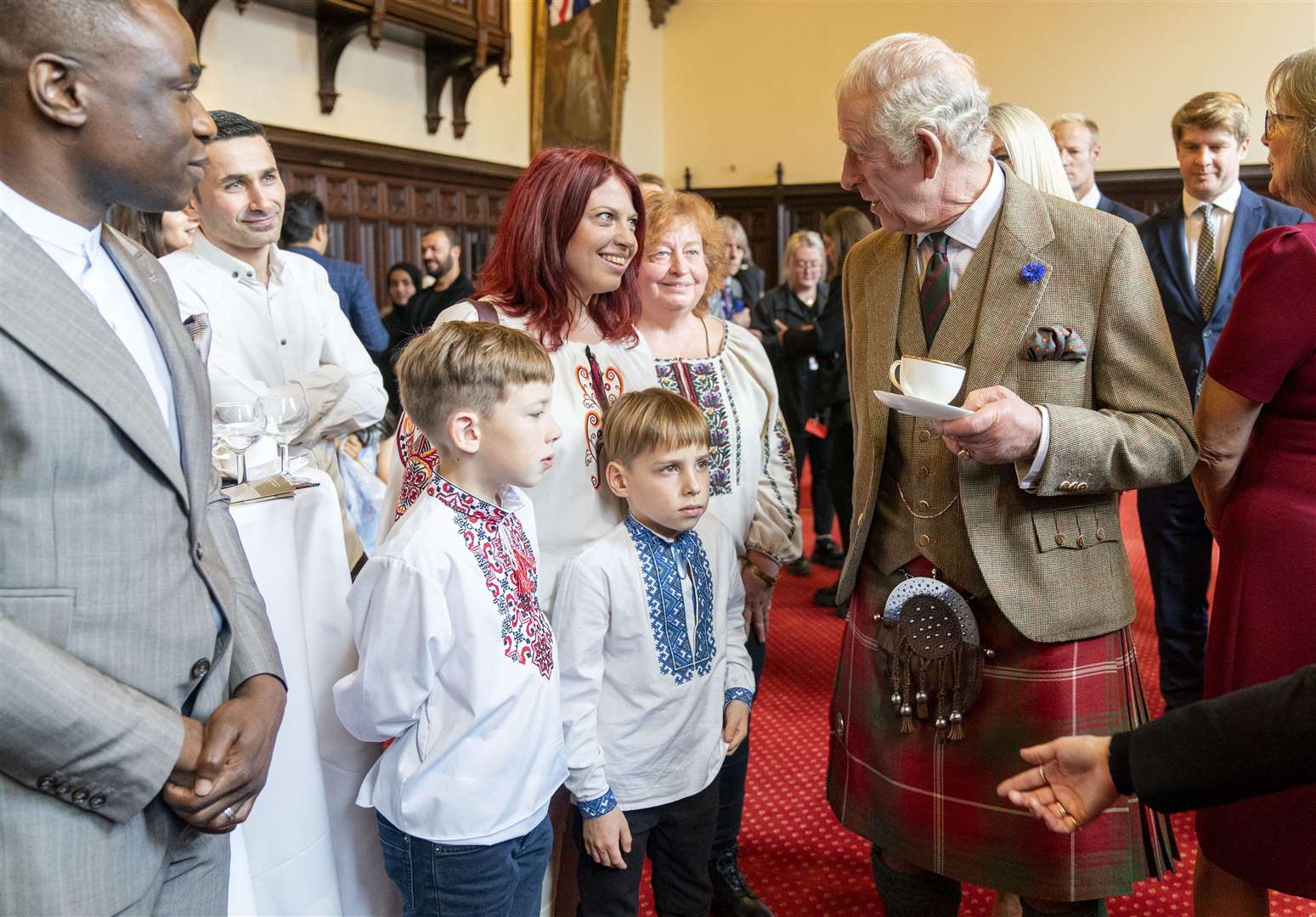 King Charles met refugees who have come from Ukraine, Syria and Afghanistan and have made a new home in Aberdeen (Jane Barlow/PA)