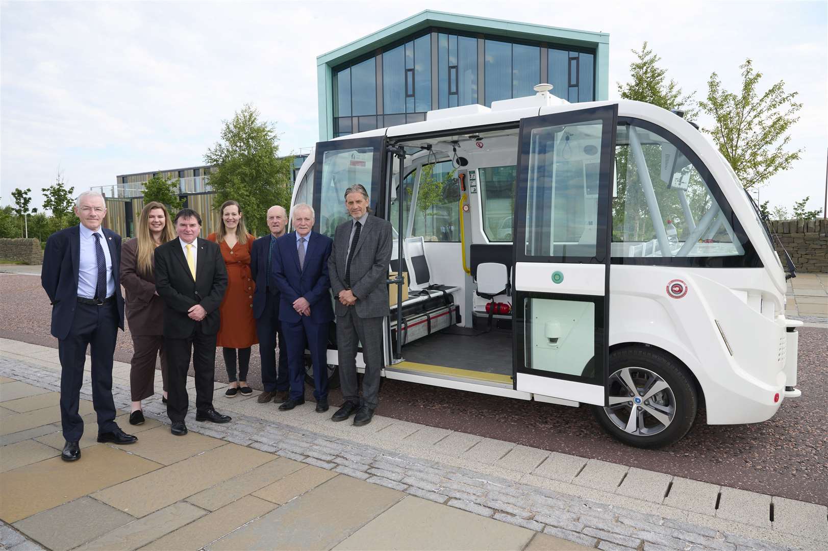 Taking a look at the first driverless bus in Inverness are Cllr David Dawson (Orkney), Cllr Amber Dunbar (Moray), Cllr Ken Gowans (Highland), Naomi Bremner, Cllr Uisdean Robertson (Comhairle nan Eilean Siar and chairman of Hitrans), Cllr Andrew Kain (Argyll & Bute) and Prof David Gray.