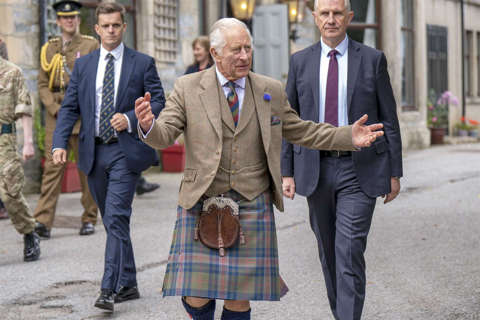 The King was wearing his new tartan for the visit (Jane Barlow/PA)