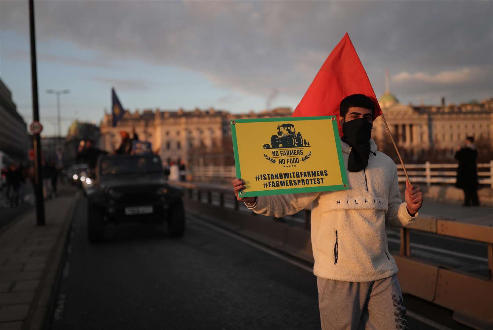 Demonstrators in London protest against the exploitation of farmers in India (Aaron Chown/PA)