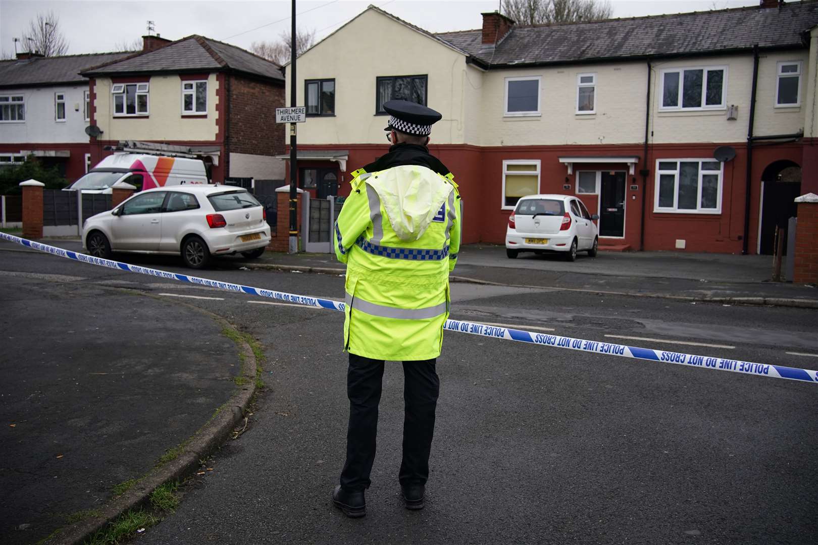 Police at the scene after a 16-year-old boy was fatally stabbed in Stretford, Manchester (Peter Byrne/PA)