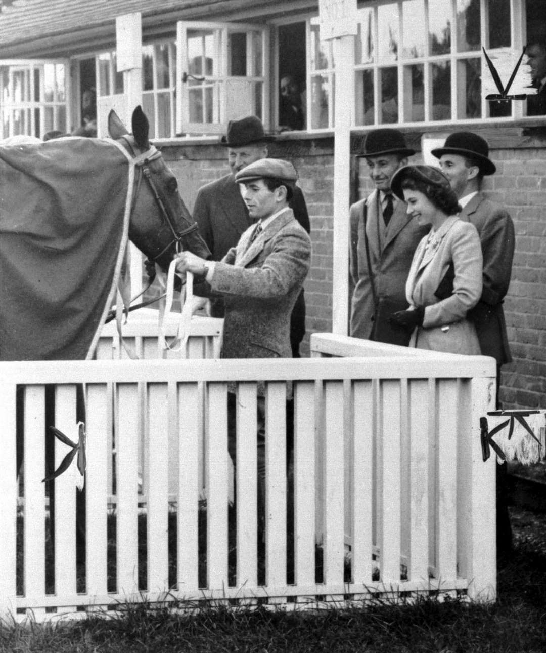 Princess Elizabeth inspects Monaveen after the victory at Fontwell Park in 1949 (PA)