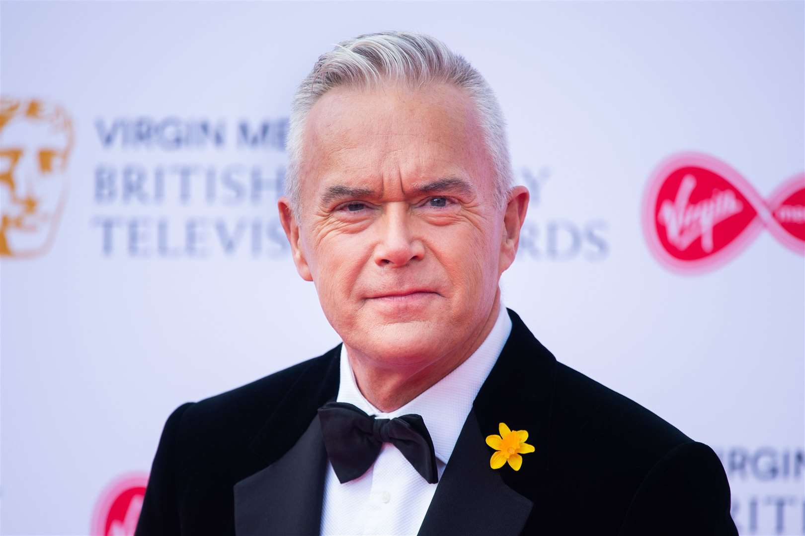 Huw Edwards has been named by his wife as the presenter at the centre of a furore at the BBC (Matt Crossick/PA)
