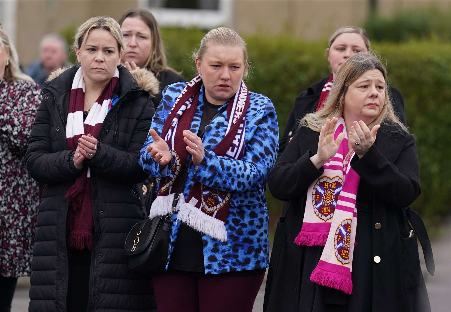 Mourners clapped as the funeral cortege left the church (Andrew Milligan/PA)