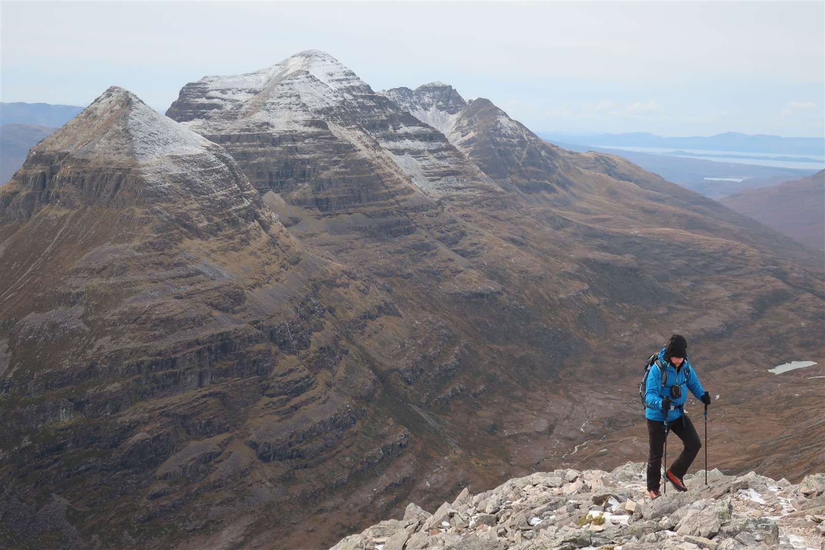 Peter on the Beinn Eighe ridge with Liathach in the background.