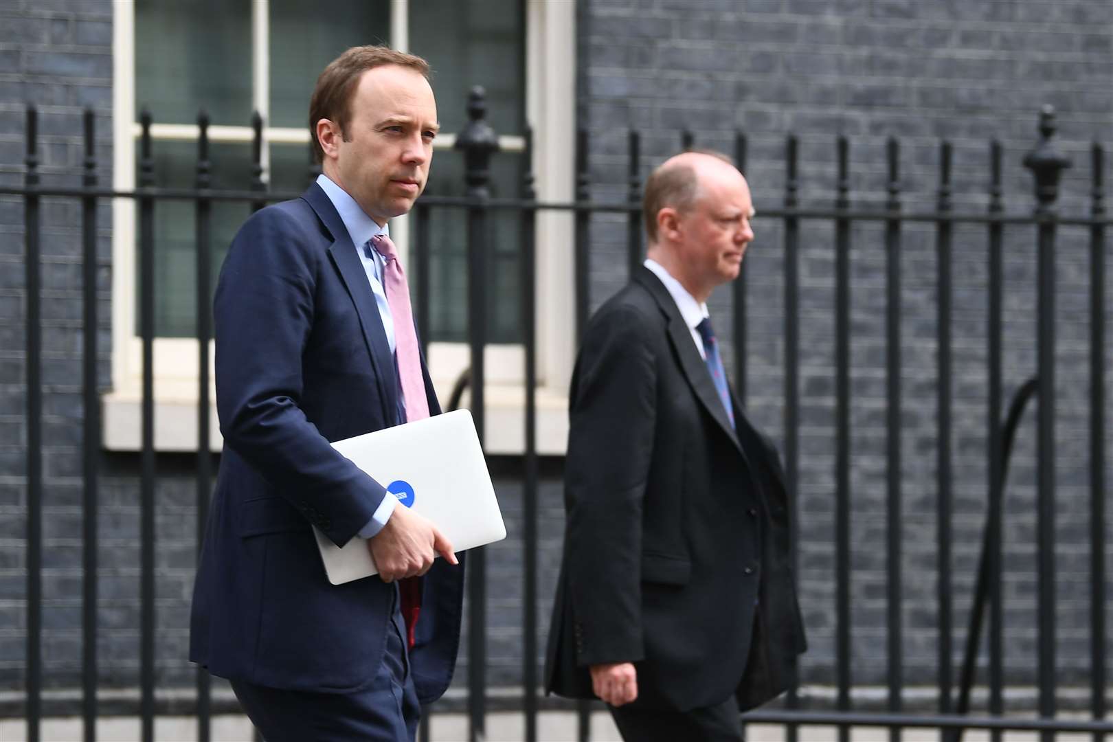 Matt Hancock and Chris Whitty leave 10 Downing Street (Victoria Jones/PA)