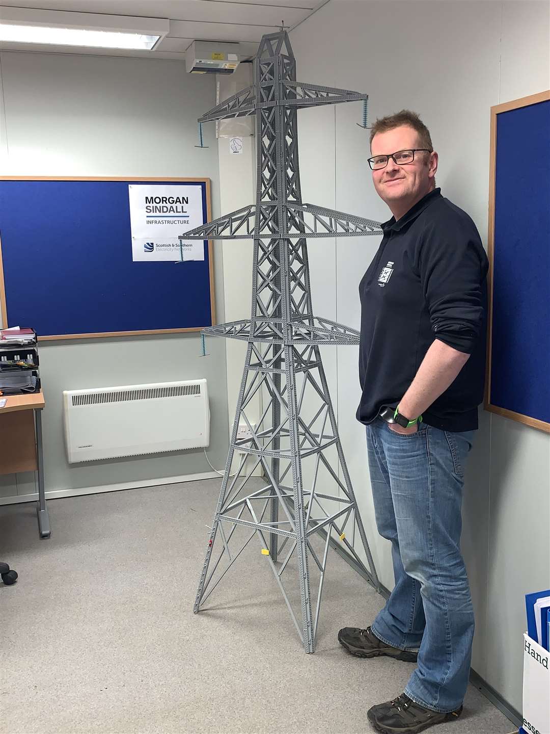 Grahame Kirsopp with his Lego transmission tower.