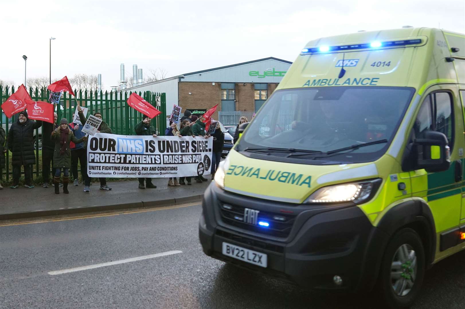 Ambulance workers on the picket line outside ambulance headquarters in Coventry (Jacob King/PA)