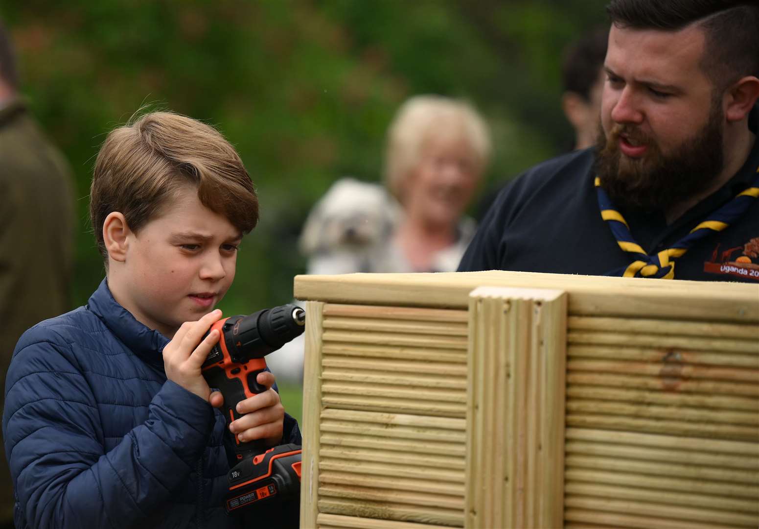 Prince George used a drill during his visit (Daniel Leal/PA)