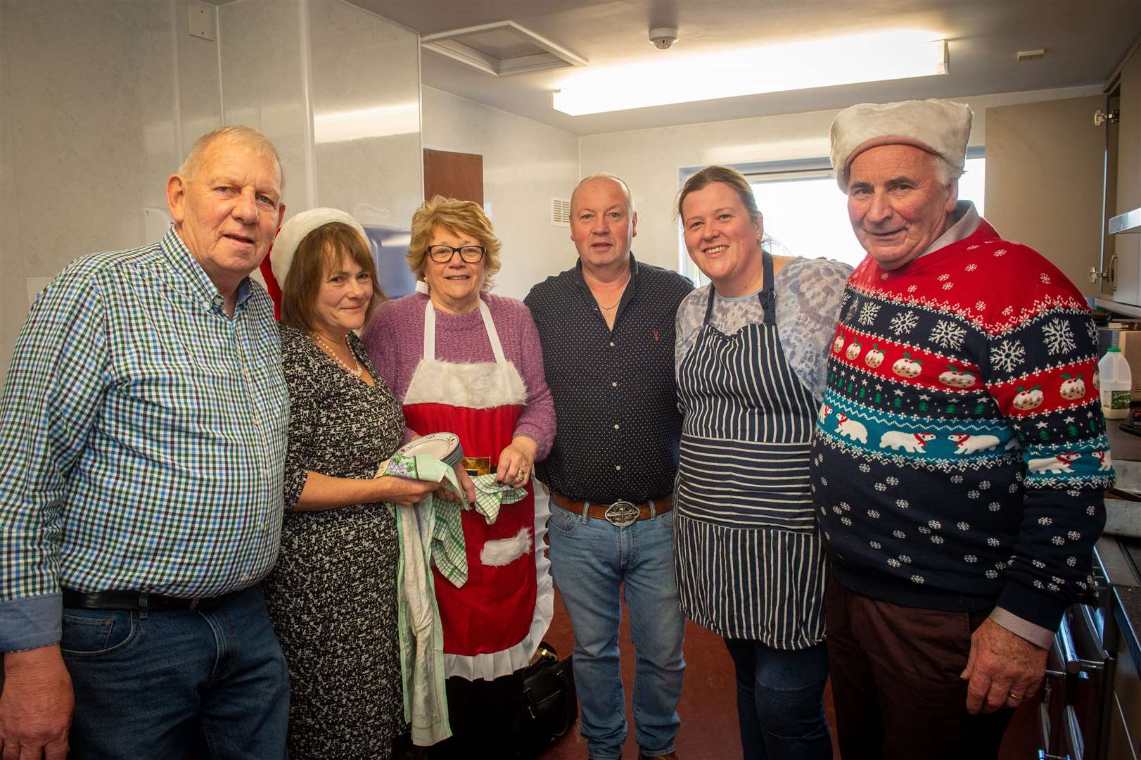 Members of the kitchen crew at North Kessock community hall pause for a picture during a successful fundraising breakfast with Santa event which raised a total of £1400 towards paying for a £60,000 care pod. Picture: Callum Mackay