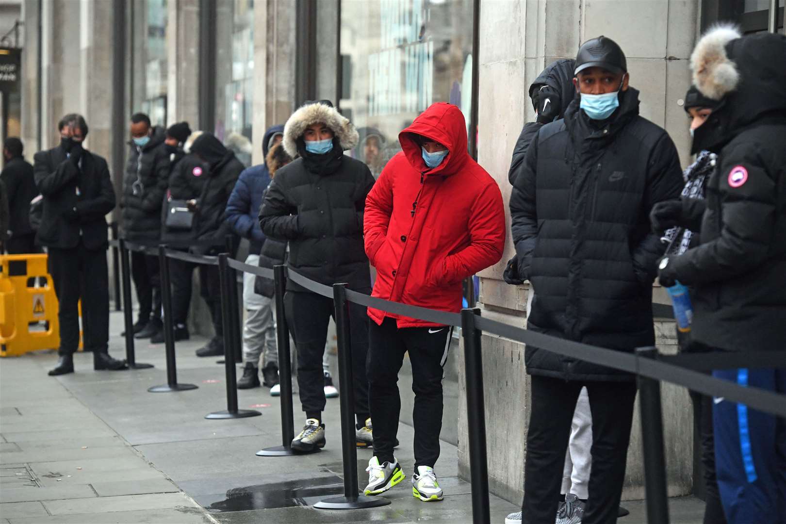 People queueing outside the Nike Town store in London’s Oxford Circus (Kirsty O’Connor/PA)