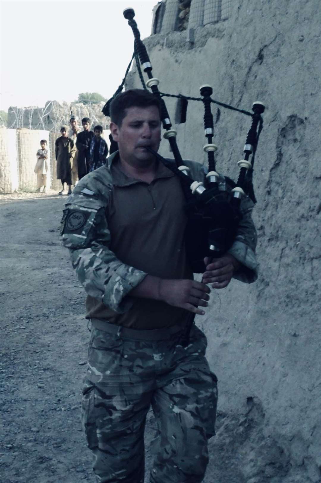 Jason served in the army where he fine-tuned his talents as a piper.