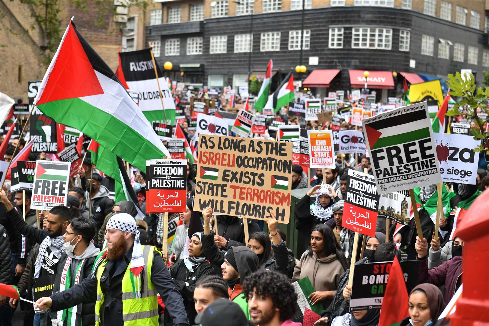 Thousands of people marched through London on Saturday to the gates of the Israeli embassy, as part of pro-Palestine protests (PA)