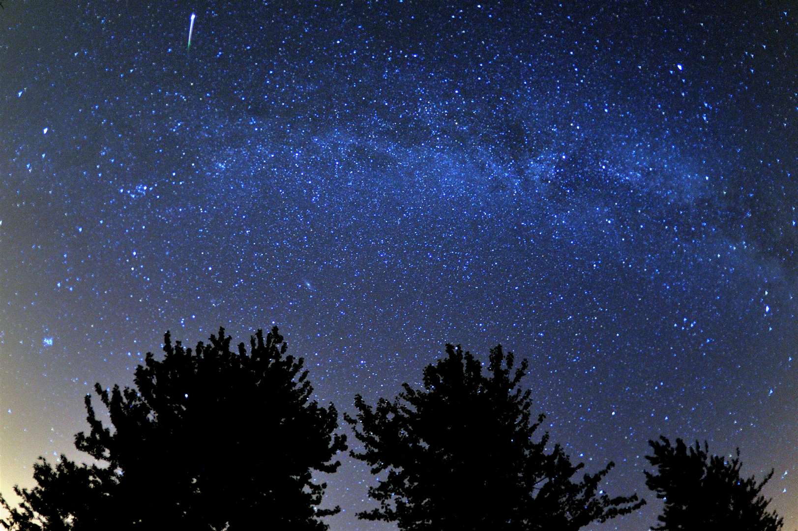 The Perseids meteor shower over Cotswold Water Park near Cirencester (Tim Ireland/PA)