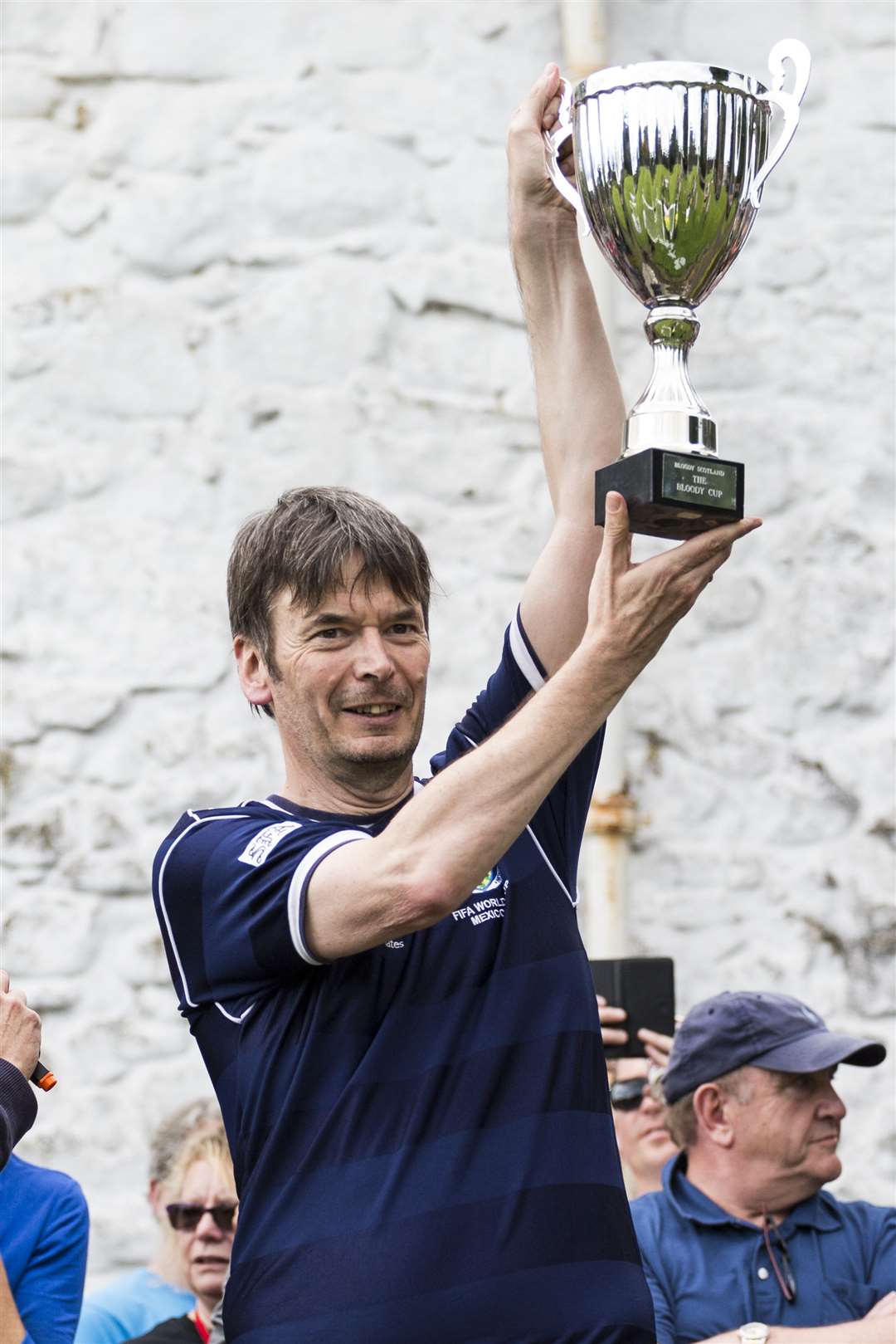 Sir Ian Rankin holding the trophy for the winning Scotland team, at Bloody Scotland in 2017. Picture: Paul Reich