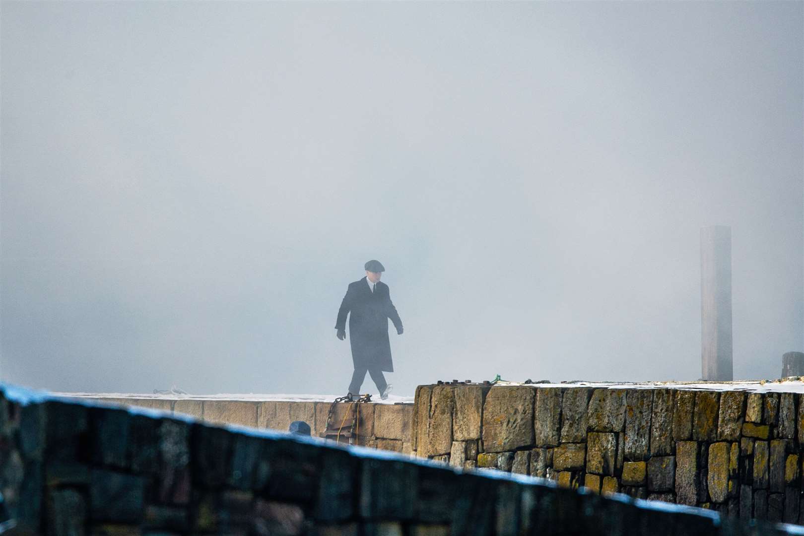 Cillian Murphy (Tommy Shelby) walks through the mist on set... Picture: Daniel Forsyth..