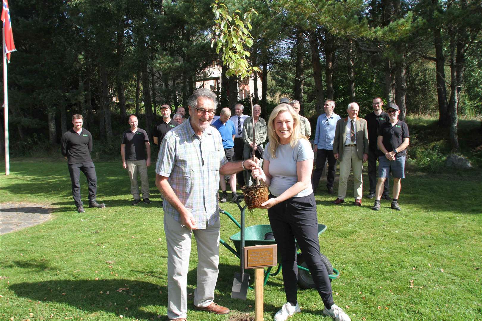 Senior forester Tony Hinde came 'out of retirement' today to join environment minister Gillian Martin MSP in planting the birthday tree which marked a century of public ownership in Glenmore Forest Park. Picture: Frances Porter.