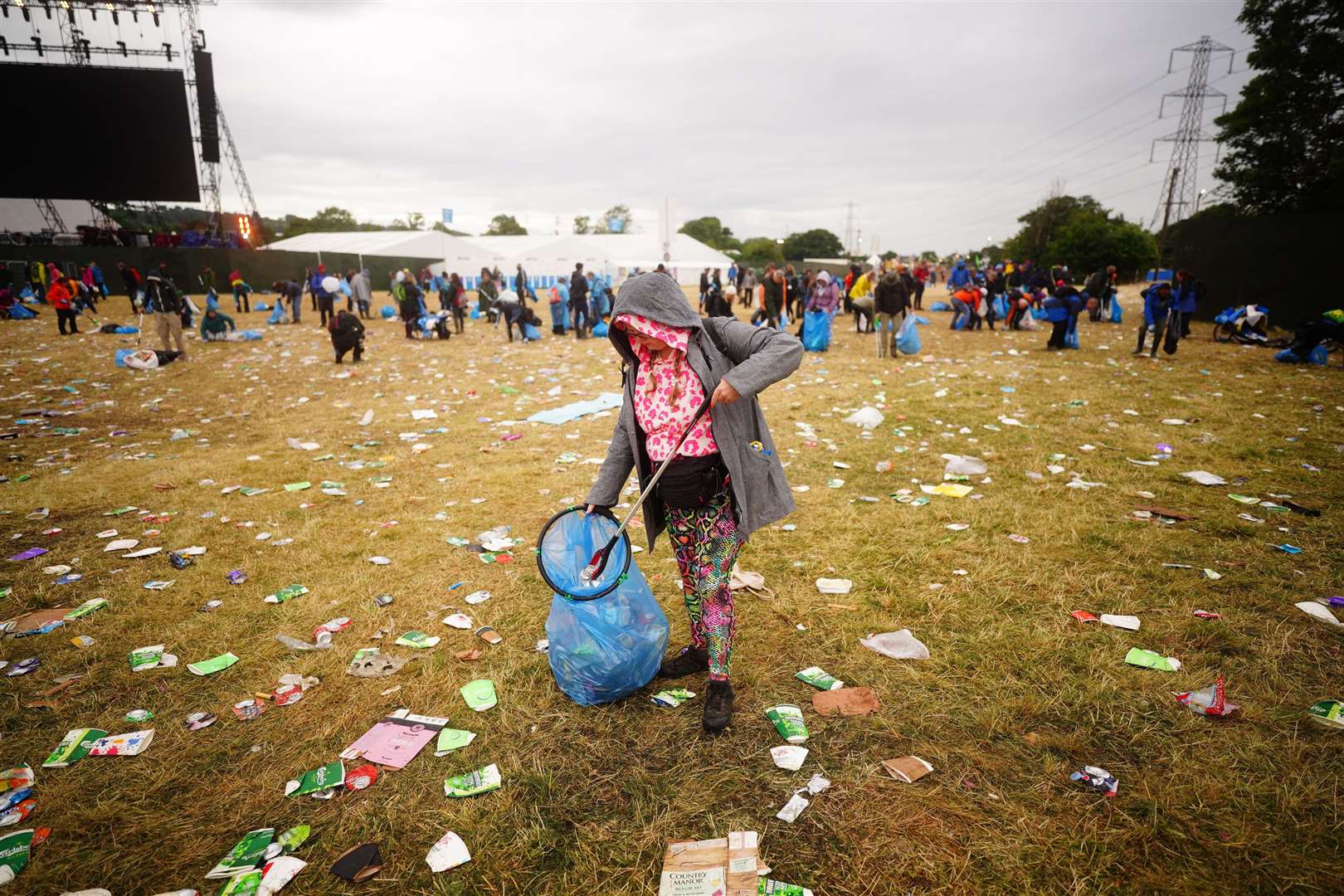 It takes effort to turn the festival back into a dairy farm site (Ben Birchall/PA)