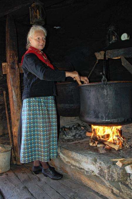Roberta making cheese the traditionally at the Alp Museum Riederalp