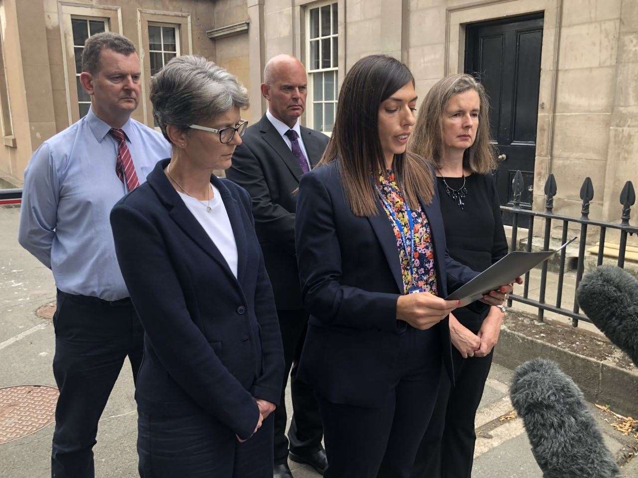 Nieces and nephews of Brenda Venables listen outside court as a statement is read by their family liaison officer, Detective Constable Claire Masters (Matthew Cooper/PA)