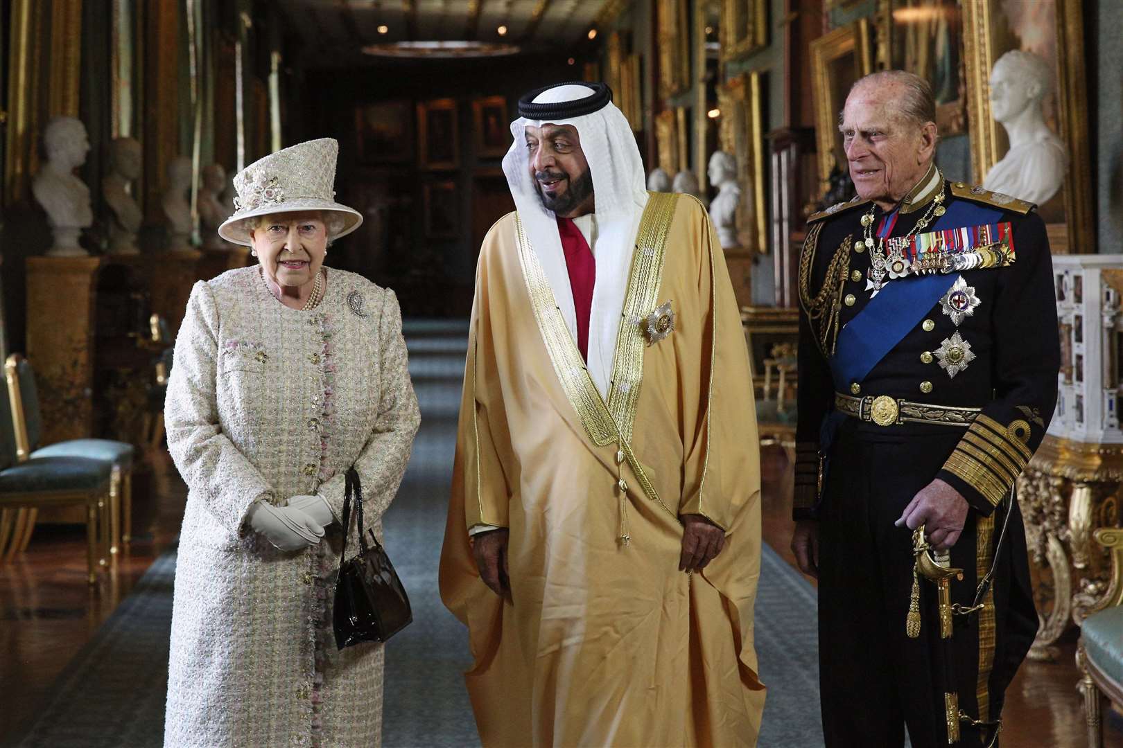 The Queen and the Duke of Edinburgh with Sheikh Khalifa bin Zayed Al Nahyan during his state visit in 2013 (Oli Scarff/PA)