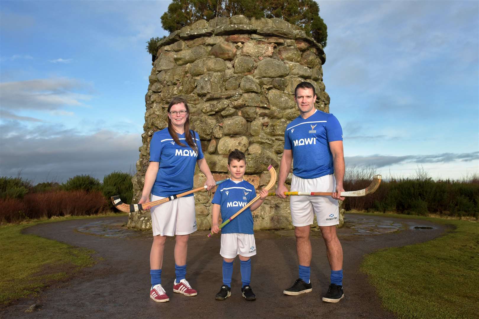Laura Gallacher from Lovat, Tobias Keir from Milbank Primary and Kinlochshiel's Finlay MacRae model the new Scotland shirts. Picture: Neil Paterson