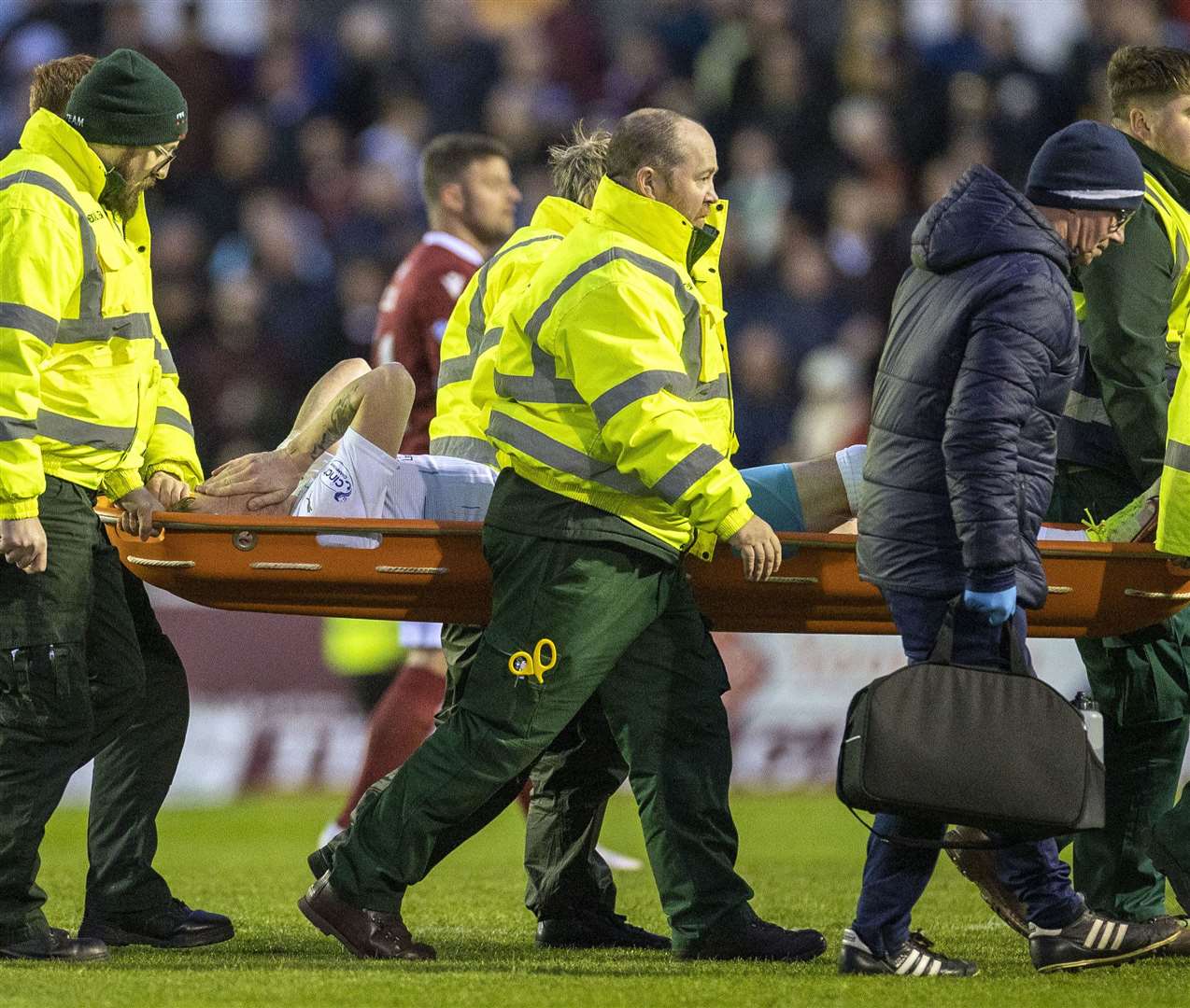 Shane Sutherland was stretchered off in the victory against Arbroath. Picture: Ken Macpherson