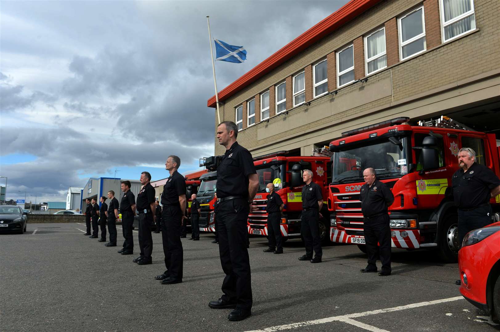 Inverness Fire Station - holding the minute of reflection for Covid at noon....Picture: Callum Mackay..