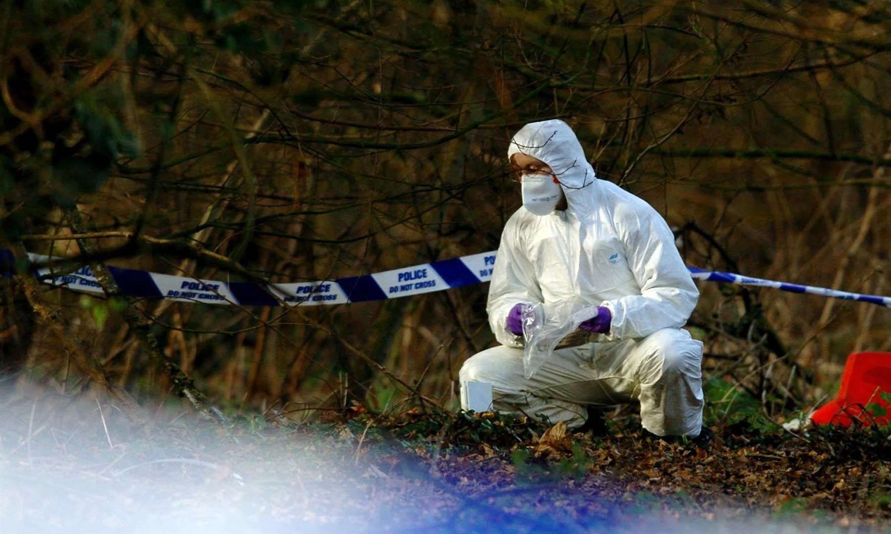 Scenes of crime officers are required to wear two pairs of plastic gloves and a mask at most crime scenes as a bare minimum (PA)
