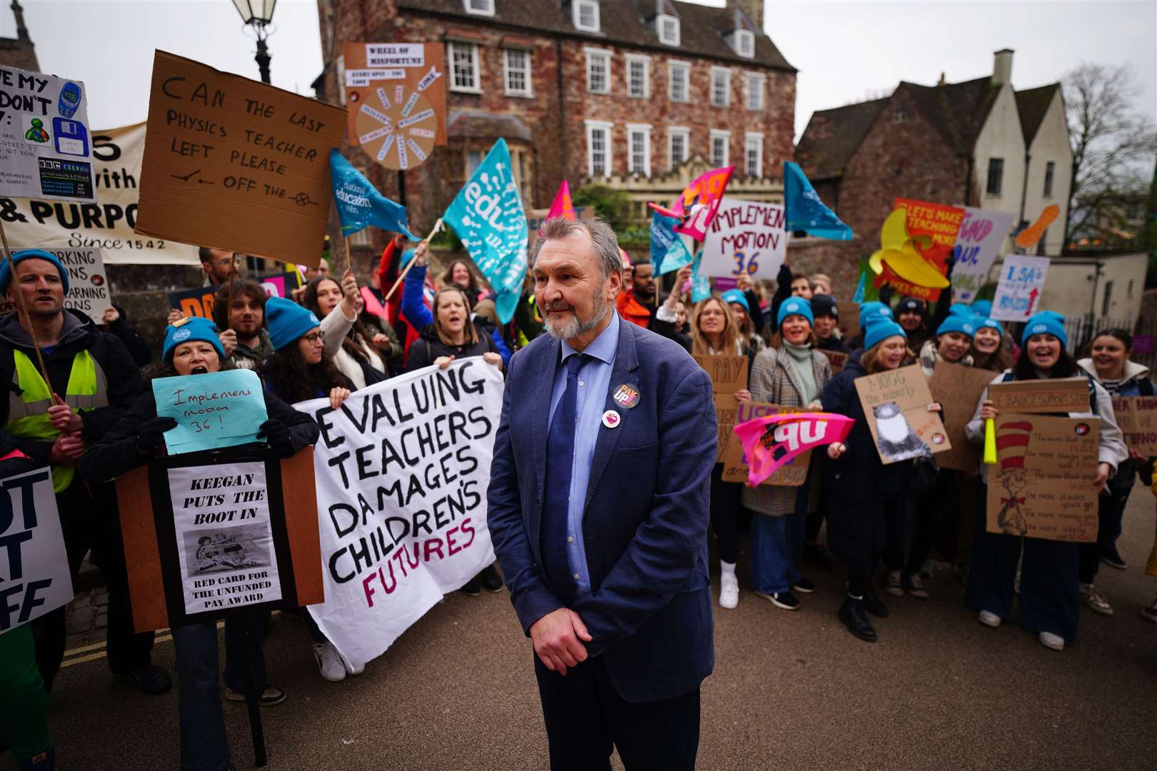 Kevin Courtney, joint general secretary of the National Education Union, with teachers on the picket line outside Bristol Cathedral School as they take strike action in a dispute over pay (Ben Birchall/PA)